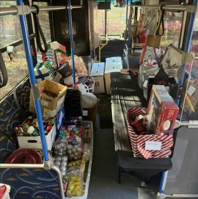 Inside the bus: boxes of decorations sorted along the seats