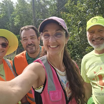 Gabriel Penfield with volunteers at a roadside cleanup